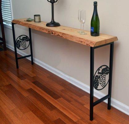 Our custom grape insert skinny table makes a wonderful piece for your wine bar.