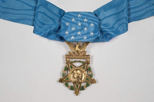 Close up photo of a Medal of Honor used for the MOH design layout and large format print currently on display in our main hallway.