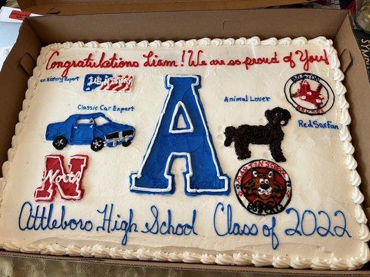 My son's high school graduation cake. I gave the bakers a sketch and they did the rest!