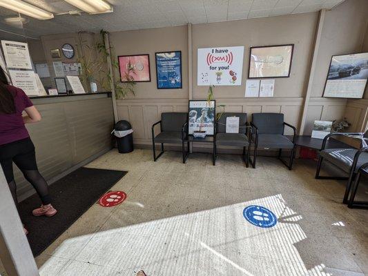 Inside. Waiting area and service counter.