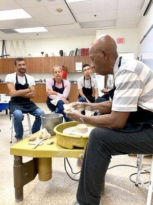 Rich at the potters wheel teaching a Date Night Pottery class.