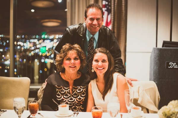 Dr. B with wife and daughter.