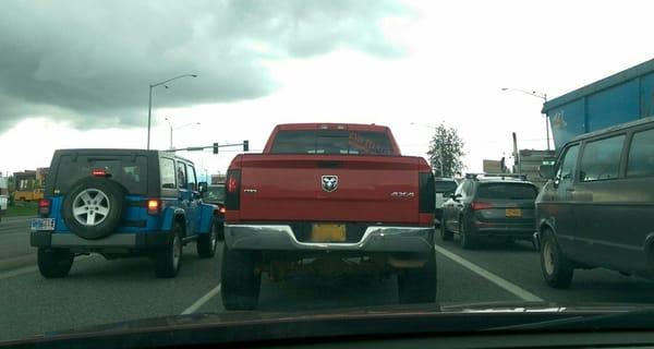 This guy's driving skills are 2nd to None suckin'. And 2 of 3 brake lights are out. Nice.