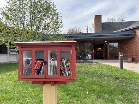 Entry to the church is on Garden Avenue, with Little Free Library in front.