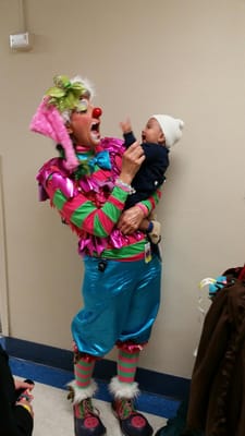 Hospital clowning with a little peanut who was determined to get my nose!