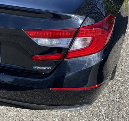 Streaks of dirt on bumper near light