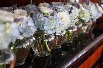 A picture of the mini vase flowers by Island Petals