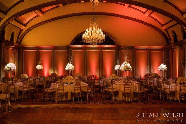 Beautiful ballroom with gold chiavari chairs