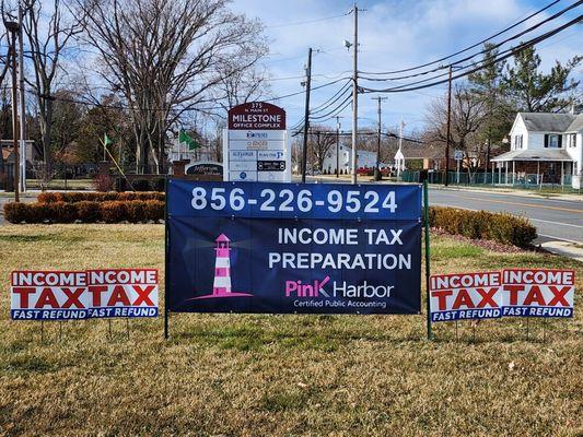 View of advertisement banner outside of Pink Harbor, CPA