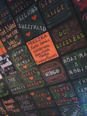 Handpainted ceiling tiles pay homage to local events, causes, businesses or people. Or you-for the right price!