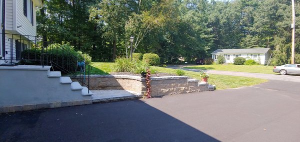 This is the completed wall on the west side of our driveway.