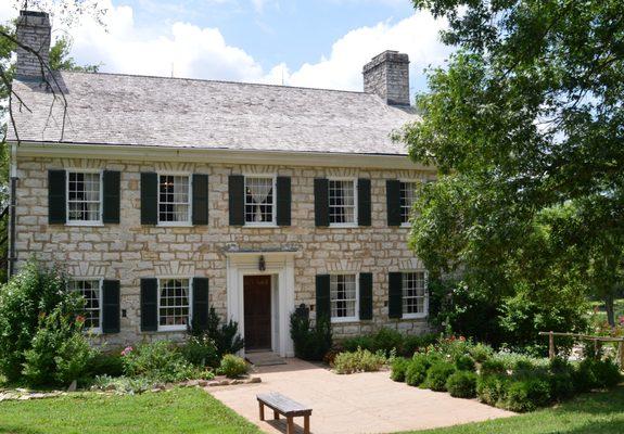 This four-story limestone house was built in the Georgian style by Nathan Boone, Daniel Boone's son.