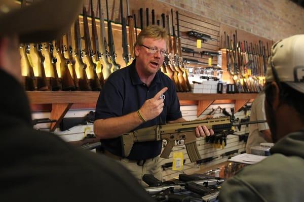 FNH USA's Tim White shows the SCAR rifle