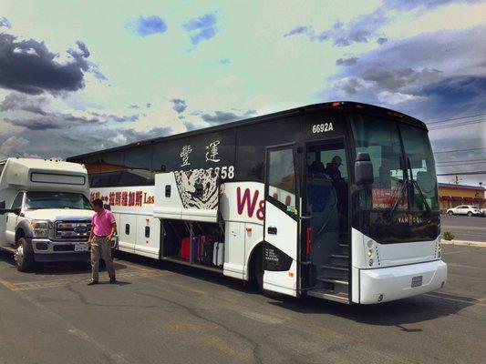 The VegasExpressBus loading passengers in LV Chinatown Plaza Arlington lot.