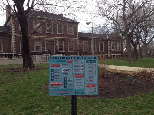 For ground across Chicago statues, background Lincoln Park cultural center