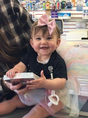 The picture the owner took of my baby girl holding her fresh invitations!