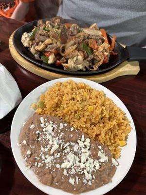 Mixed chicken & beef Fajitas w/ included side of rice & beans