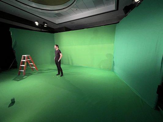 Three-sided green screen for a special effects shot.