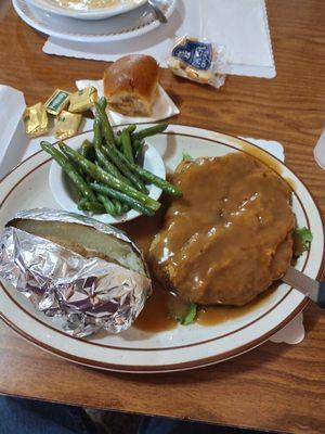 Chicken fried steak under a delicious brown gravy!! 5+++stars Baked potato 3 star Green beans 2 stars, Roll1 star