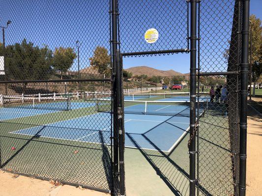 Pickleball fenced in all 4 courts