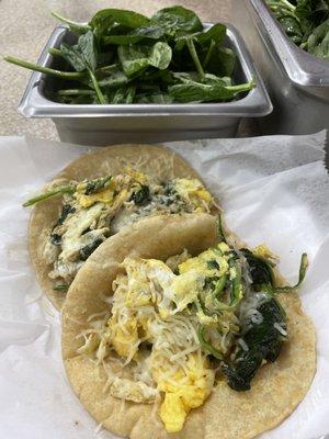 Spinach, egg and cheese in homemade corn tortilla