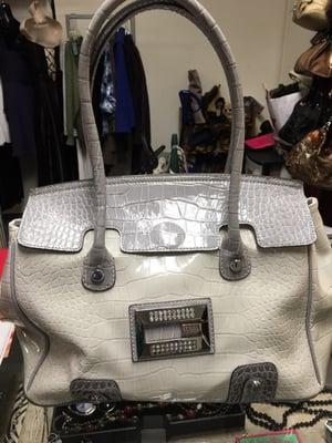 Gray and silver Guess bag.