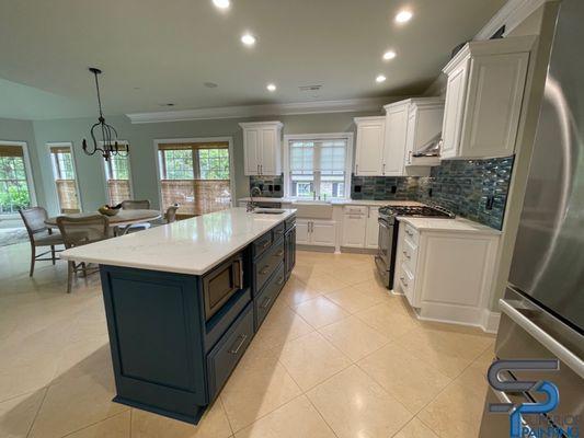 Kitchen remodel - painted all cabinetry, new stove hook, new backsplash