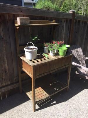 The wife has already put her potting table to good use.