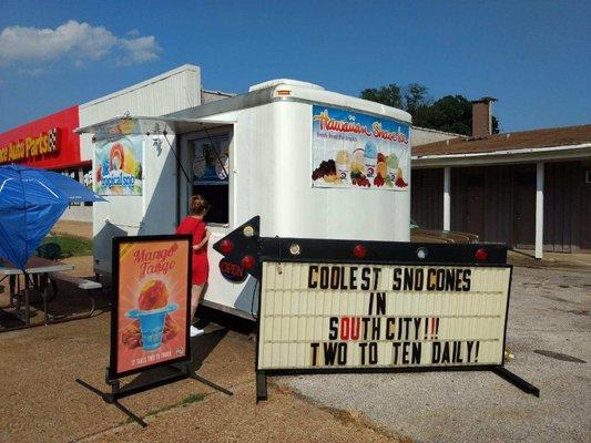 This is our shaved ice trailer freshly painted and ready for business!