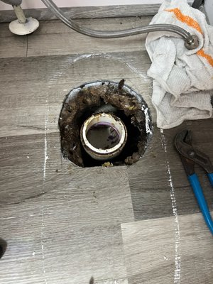 The rotting subfloor as seen after master bathroom toilet was pulled by the plumber to investigate the leak.