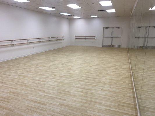 Our dance studio spans 800 square feet and boasts top-quality oak rubber dance flooring, ballet barres, and floor-to-ceiling mirrors.