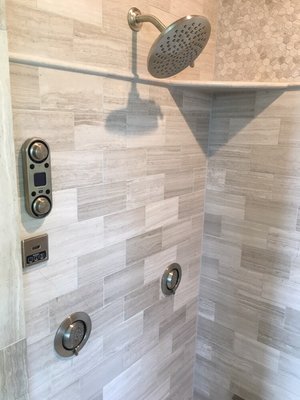 Full digital shower including 4 body sprays, handheld head, fixed head, and steamer.