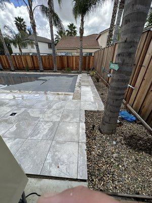 Porcelain pool deck, auto cover, and pool.