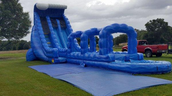 Setting another water slide rental