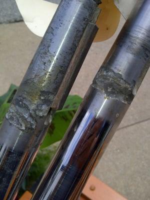 The pair of dangerously corroded prop shafts Mike Weddell found in my boat and then unscrupulously covered up.