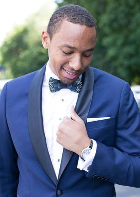 A #CCCGroom looking sharp in his Navy Blue Wedding Tuxedo with a Shawl lapel, complemented with a Brackish Bow Tie!