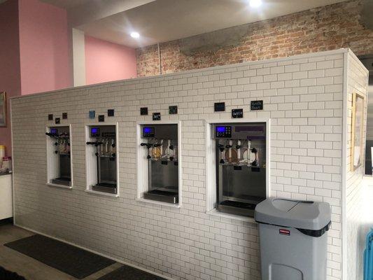 Frozen yogurt dispensers.