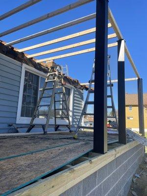 Installation of beams for front porch!