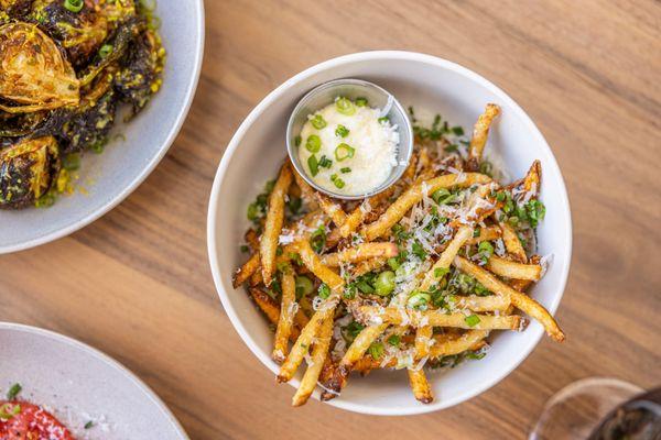 - Truffle Fries - 
 Truffle Oil, Grana Padano, Herb, Truffle Aioli