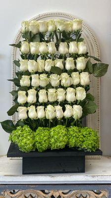 Levels of White Roses! 
You have that at your house and it'll turn heads!