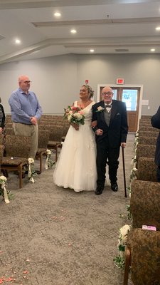 My father walking her down the aisle.