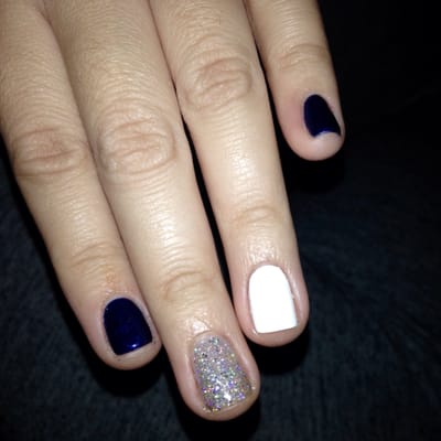 gel mani with glitter design