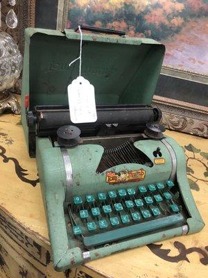 Old, small typewriter.