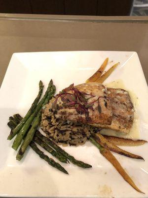 Blackened Red Fish upon a bed of wild rice.