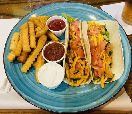 Chicken tacos and fries