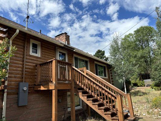 Stained log hazelnut color (note porch was not stained per our request)