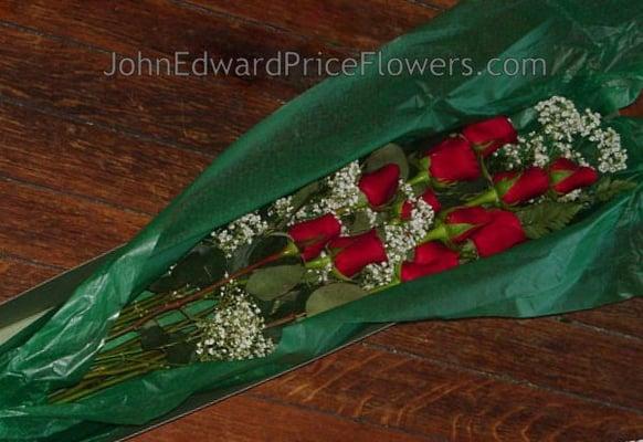 A dozen long-stemmed red roses.