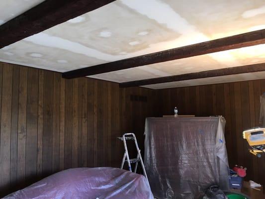 After popcorn ceiling was removed, before painting...