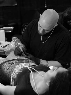 Our Tattoo artist and Owner Chis P