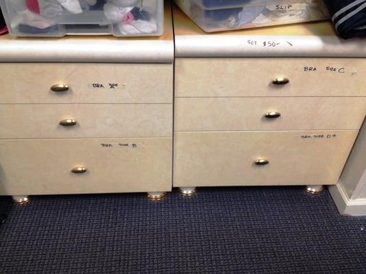 Bras & lingerie organized neatly by size.